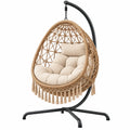 Fotel wiszący 105 x 105 x 195 cm rattanowy beżowy z metalowym stojakiem w stylu boho
